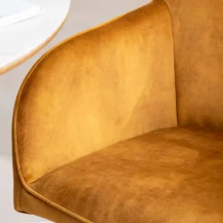 ClaudieFauteuil cosy pivotant en tissu avec pieds en métal